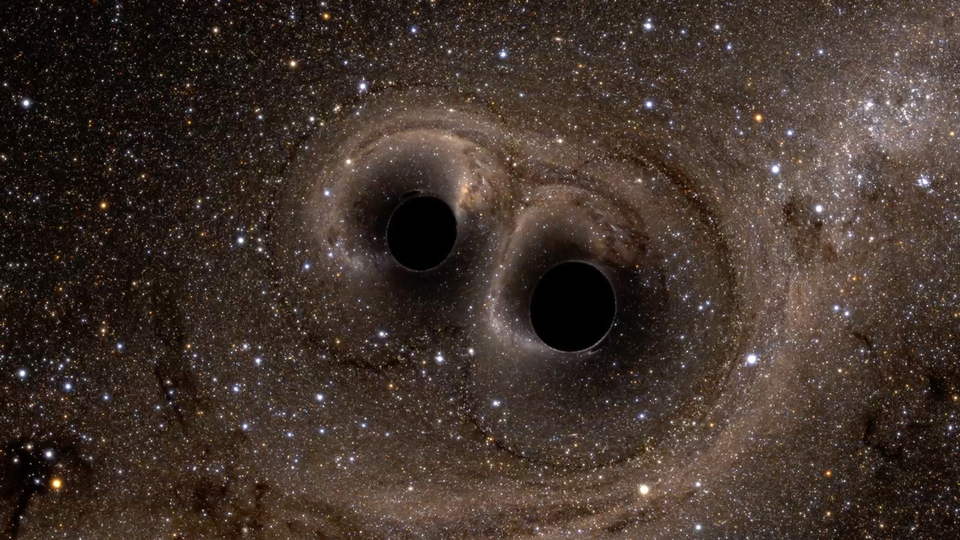 image of two black holes and gravitational waves