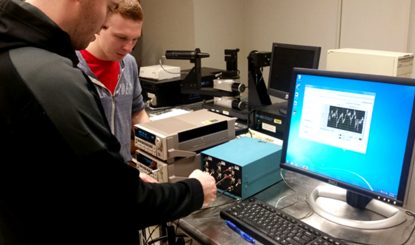 two students in a computer lab