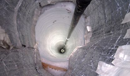 deep hole drilled into ice